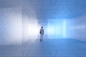 Lone woman walks with back to viewer in a futuristic room